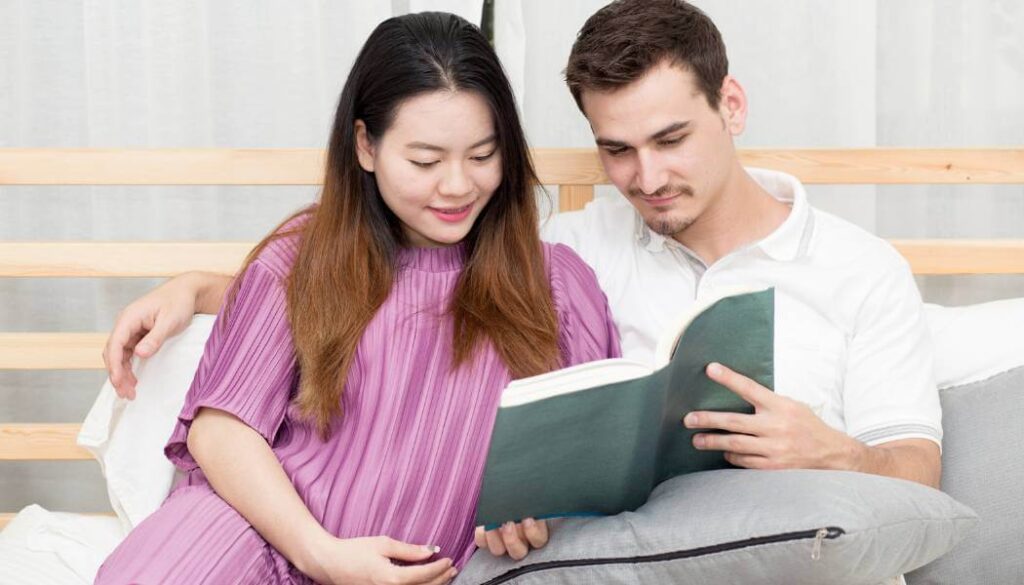 couple reading a children’s book