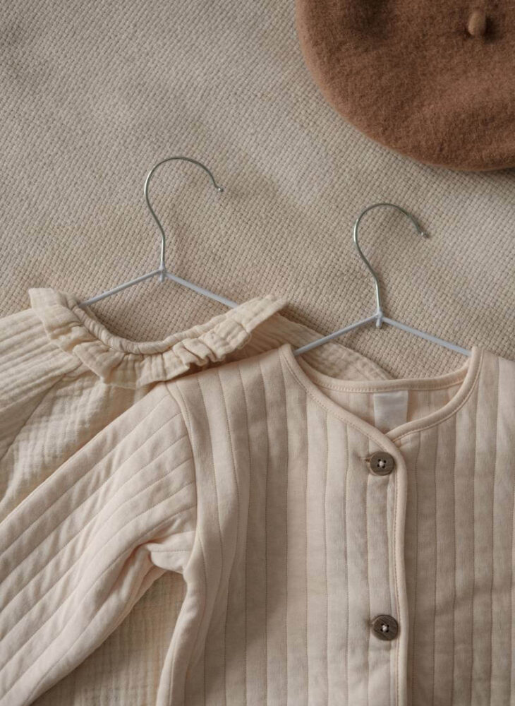 baby clothes on hangers