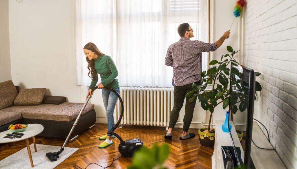 couple cleaning house