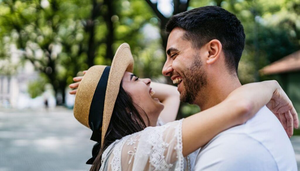 couple laughing together close up