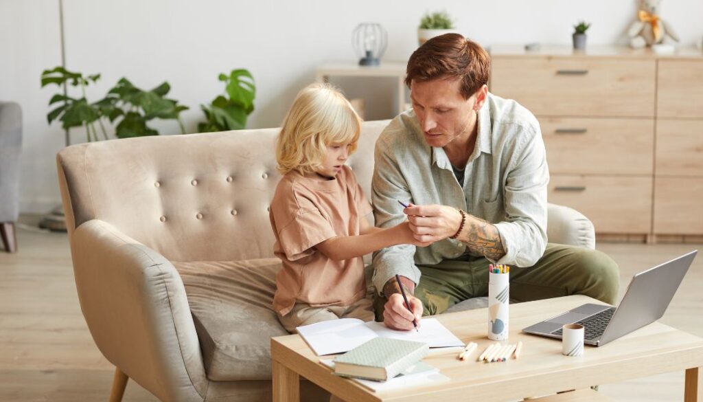 dad and kid doing homework