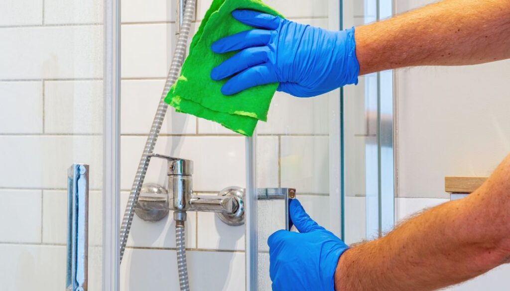 man cleaning the bathroom