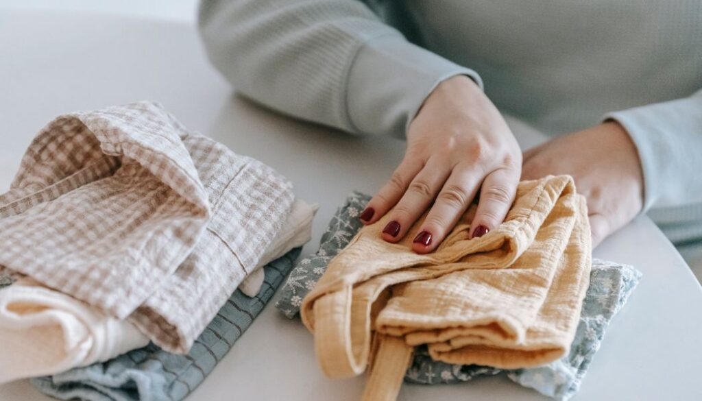 woman and baby clothes