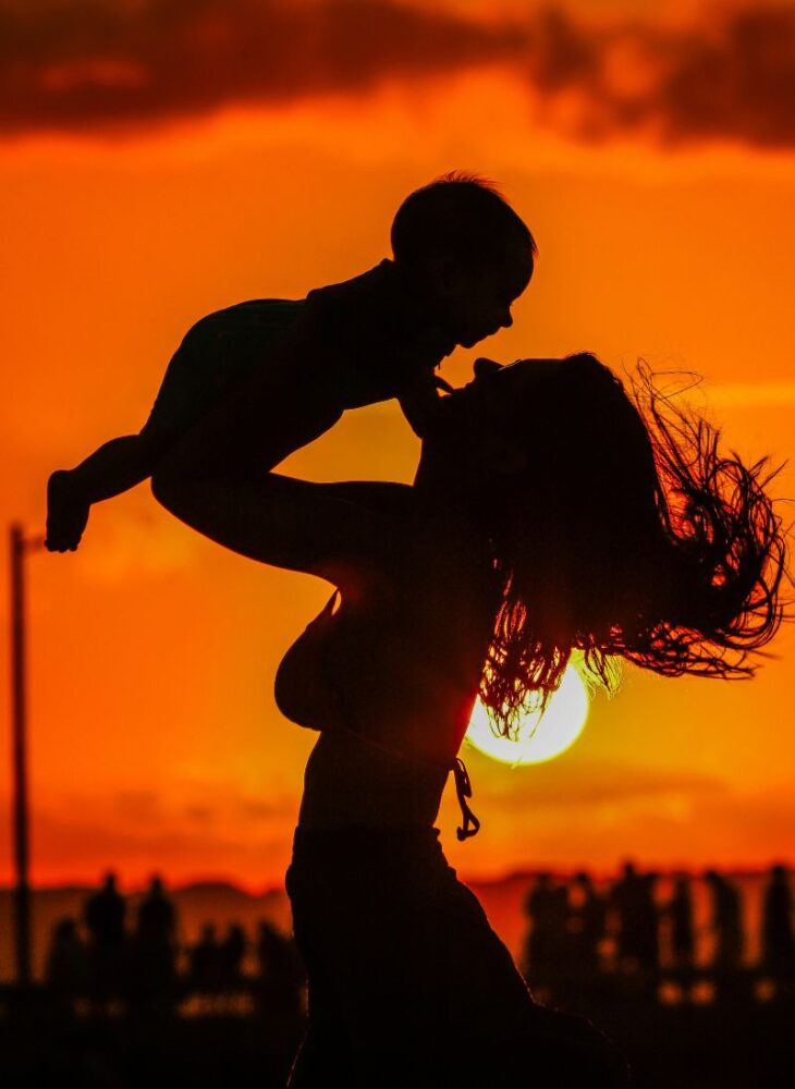 mom and baby at the beach