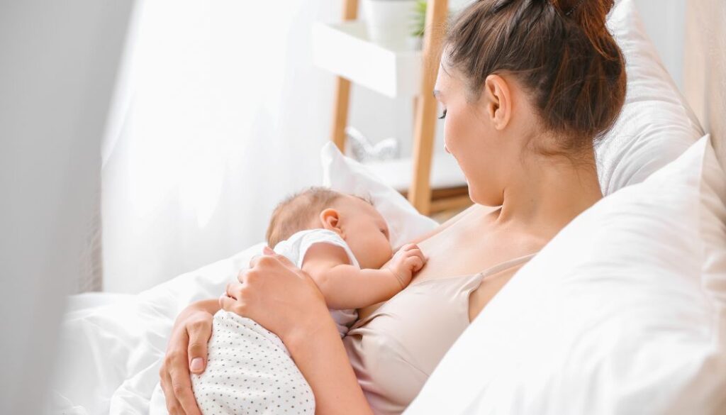 mom looking at a baby