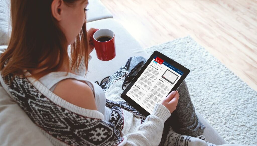 woman reading kindle