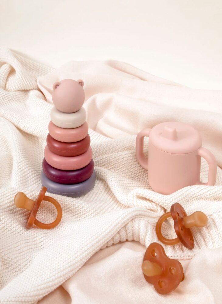 baby cup, toy and pacifiers