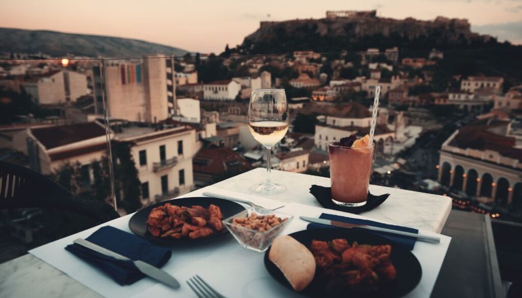 romantic dinner at sunset in a rooftop bar
