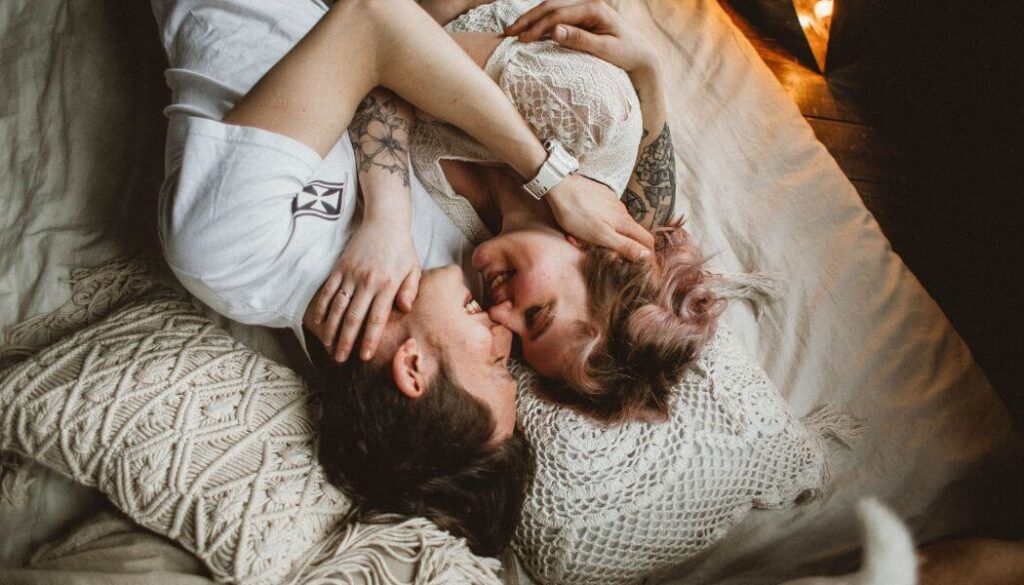 couple hugging in bed